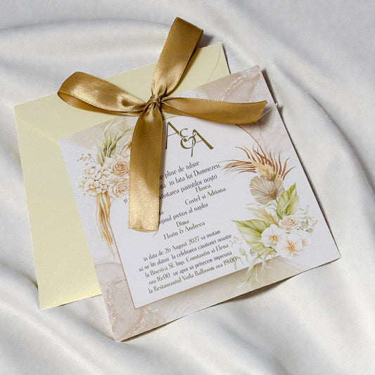 Invitație nuntă elegantă crem cu fundiță aurie și design floral premium